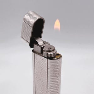 Cartier Vintage WORKING Oval Lighter in Silver Plated Barley Grain d’Orge 1970’s