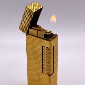Dunhill Rollagas WORKING Vintage Lighter in a Gold Plated “S” Wave Pattern (early 1980’s)