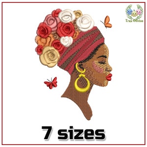 May include: Embroidered design of a woman with a red and brown head wrap adorned with colorful flowers. She has large gold hoop earrings and a brown skin tone. The design includes two butterflies.