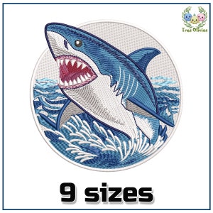 May include: An embroidered design of a shark jumping out of the water with its mouth open. The shark is white and blue and is in a circle with a white background and blue waves. The text "9 sizes" is below the circle.