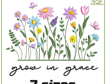 Könnte beinhalten: Stickerei mit einem bunten Blumengarten mit Schmetterlingen und dem Text "grow in grace" und "7 Größen".