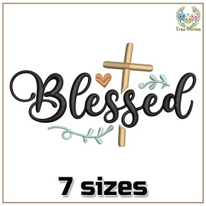 Puede incluir: Diseño de bordado negro y dorado de una cruz con la palabra "Blessed" y un pequeño corazón. El diseño está disponible en 7 tamaños.