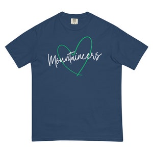 May include: A navy blue t-shirt with a white heart design and the text "Mountaineers" in white script.