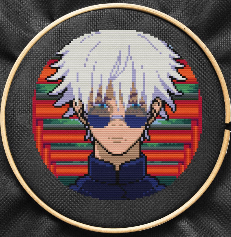 May include: Cross-stitch embroidery of an anime character with white hair, wearing sunglasses and a dark blue shirt, against a red and green background.