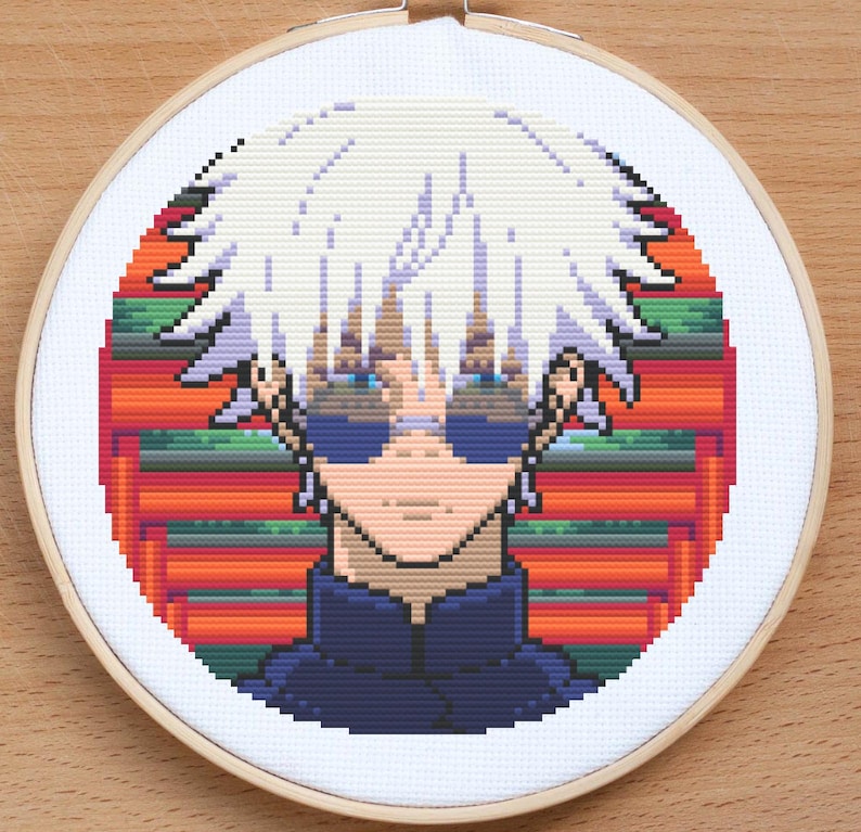 May include: Cross-stitch embroidery of a white-haired anime character wearing sunglasses against a red and green background.