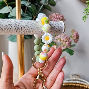 Pulsera Daisy, llavero de cuentas de silicona, pulsera elástica