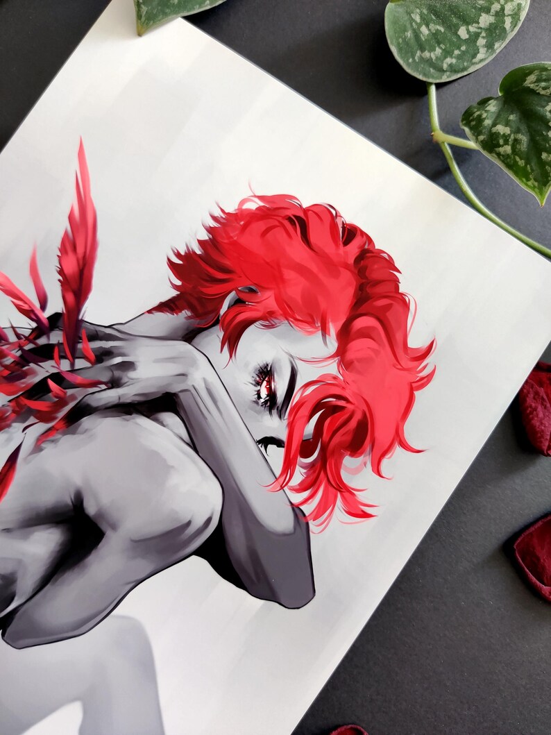 May include: Grayscale illustration of a person with vibrant red hair and accents. The person is depicted in a seated pose, with arms wrapped around themselves. The artwork is on white paper, with red details.
