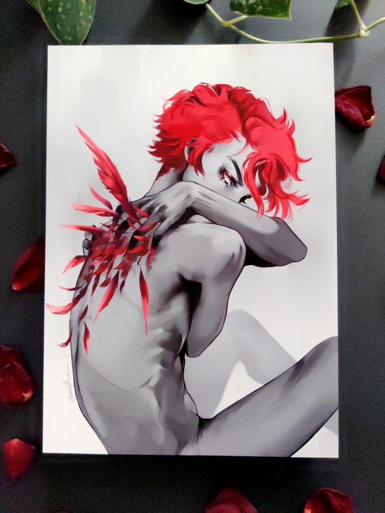 May include: A grayscale artwork depicting a person with bright red hair and red feather details on their back. The person is seated, arms crossed, with their face partly hidden. The image has a dramatic, artistic style, with a focus on colour contrast.