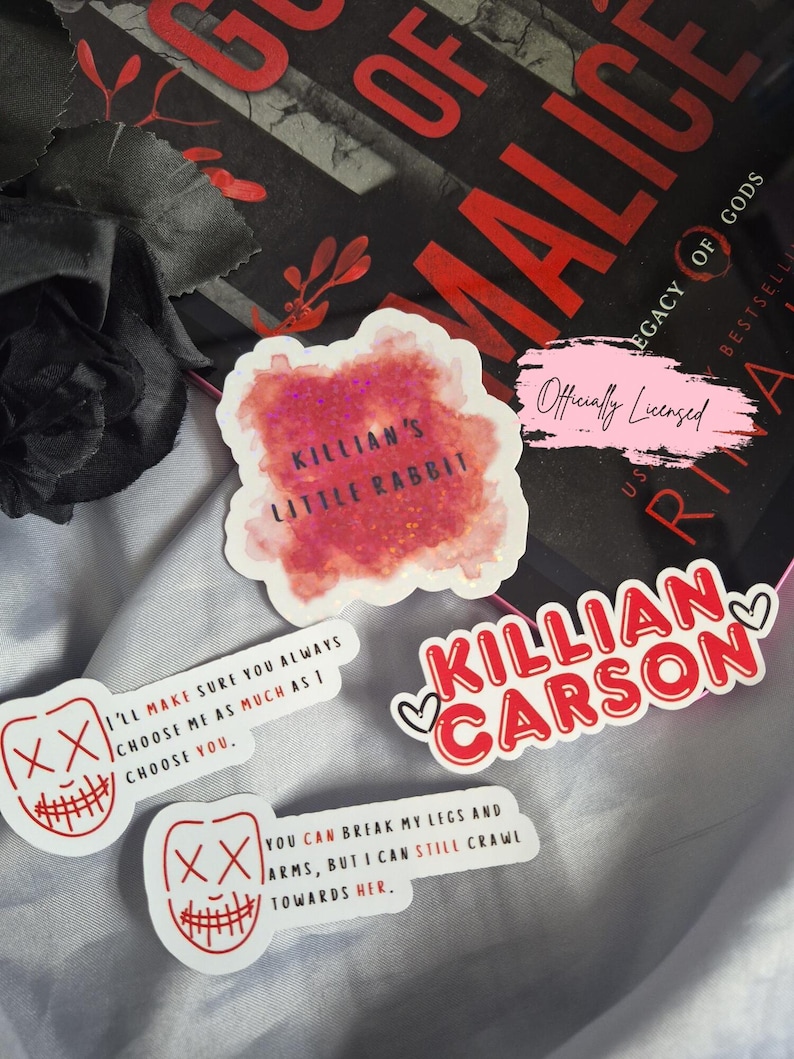 May include: A collection of stickers with text and graphics. One sticker reads "Killian's Little Rabbit" in pink glitter. Another says "Killian Carson" in red. Two stickers feature a mask design with text, including "I'll make sure you always choose me as much as I choose you."