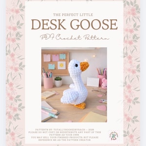 May include: A crochet pattern titled "DESK GOOSE" with a photo of a white and orange goose plushie. The pattern is a PDF and includes the text "THE PERFECT LITTLE DESK GOOSE PDF Crochet Pattern". The image has a floral border.