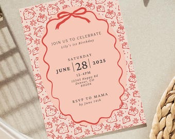 May include: A pink and red birthday invitation with a strawberry pattern. The invitation reads "Join us to celebrate Lily's 1st Birthday" and includes the date "Saturday, June 28, 2025" and the time "12-4PM". The invitation also includes the address "12345 Happy Rd, Denver, CO 80206" and the RSVP information "RSVP to Mama by June 14th".
