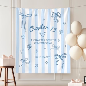 May include: A light blue and white striped backdrop with the text "Chapter 13, A Chapter Worth Remembering" and decorative bows, hearts, and flowers. A gift box and balloons are in the foreground.