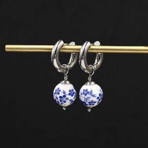 Delft Style Porcelain Bead Hoop Earrings: Stainless Steel Floral Charms