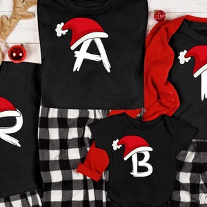 Personalized Christmas Pajama TShirts with Santa Hat Initials  Matching Family Holiday Shirts