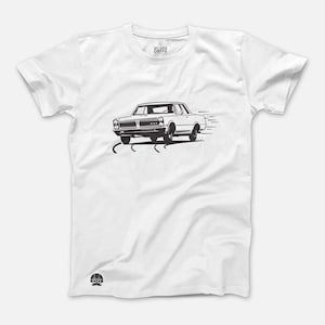 May include: White t-shirt with a black and white illustration of a vintage car driving fast. The text "Get Out & Drive" is printed on the shirt.