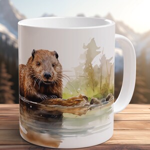May include: White ceramic mug featuring a watercolour illustration of a brown beaver sitting on a log in a pond. The beaver is looking directly at the viewer. The background is a watercolour illustration of a forest.