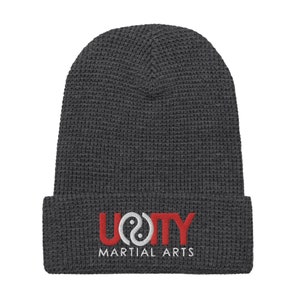 May include: Gray waffle knit beanie with a red and white embroidered logo that says "Unity Martial Arts" with a yin yang symbol.
