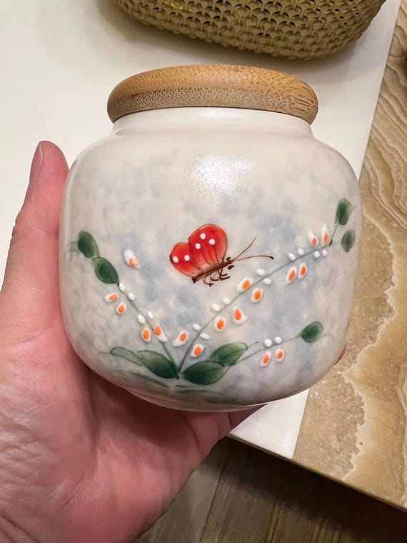 Hand-Painted Ceramic Tea Jar: Butterfly Blossom Design, Bamboo Lid