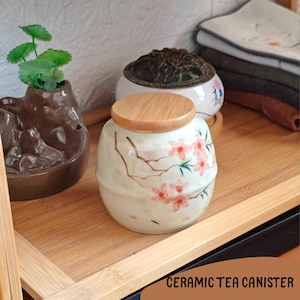 Hand-Painted Ceramic Tea Canister – Peach Blossom Design with Bamboo Lid – 250ml (8.45 fl oz) – Floral Storage Jar for Tea, Herbs, Spices