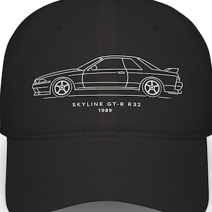 Puede incluir: Un juego de tres tazas de cerámica con un acabado mate moteado. Las tazas son de color crema, gris claro y gris oscuro. Cada taza tiene un diseño simple y minimalista y un asa redondeada.