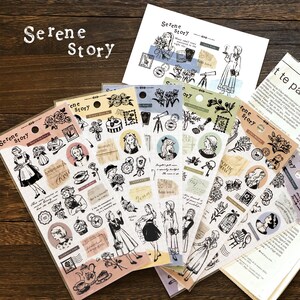 May include: A collection of decorative stickers with a vintage aesthetic. The stickers feature illustrations of women, flowers, and other vintage-themed elements. The text "Serene Story" is visible on the stickers.