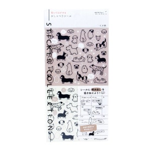 May include: A sheet of stickers featuring black and white illustrations of dogs in various poses. The stickers are on a light brown background with the text "貼ってはがせる おしゃべりシール" and "イヌ柄" in Japanese. The stickers are designed to be used for adding speech bubbles to the dogs.