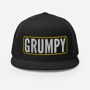 May include: Black trucker hat with a yellow and white embroidered patch that says "GRUMPY".