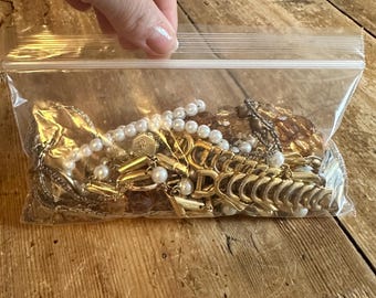 Mystery jewelry bag gold tone