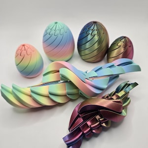 Segmented Flowing Egg Fidget Toy – Tricolor Chromatic or Pastel Gradient Desk Toy