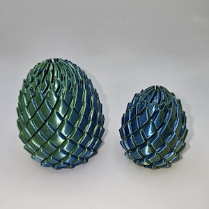 May include: A set of three ceramic vases in varying heights. The vases are white with a textured, ridged design. The tallest vase is approximately 10 inches tall, the medium vase is 8 inches, and the smallest is 6 inches.