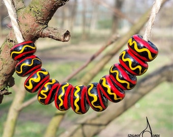 Black glass beads with yellow and red lines inspired by finds from Norway (Øvre Haugen) - 9th-11th century - Viking era - two beads