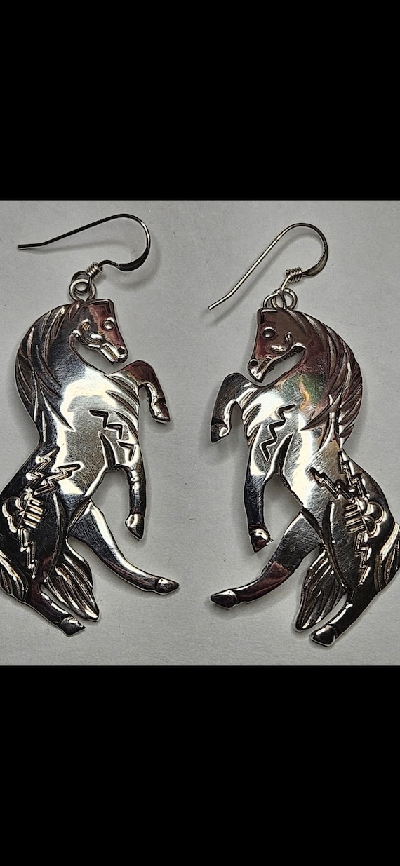 Sterling silver dangle horse earrings signed by Al