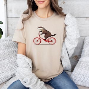 Otter Riding A Bike Shirt, Cute Otter Shirt, Otter Lovers Shirt, Animal Lovers Shirt, Funny Shirt