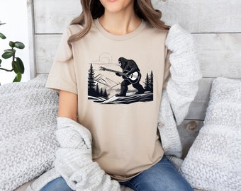 Bigfoot Playing Guitar In The Woods Shirt, Bigfoot Shirt, Yeti Shirt, Sasquatch Shirt, Bigfoot Gift, Camping Shirt, Outdoors Shirt