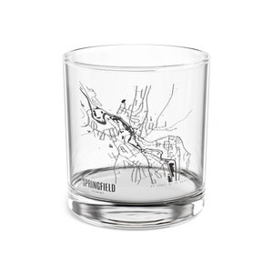 以下が含まれることがあります： 透明なガラス製のタンブラーで、側面にスプリングフィールド、ミズーリ州の白黒地図が印刷されています。地図の下には「スプリングフィールド、ミズーリ州」という文字が印刷されています。