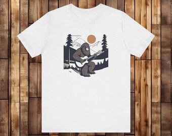 Bigfoot Playing Guitar In The Woods Shirt, Bigfoot Shirt, Yeti Shirt, Sasquatch Shirt, Bigfoot Gift, Camping Shirt, Outdoors Shirt
