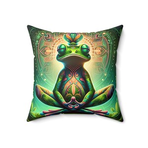 May include: A green frog with colourful patterns sits in a meditative pose on a cushion with a mandala design. The frog has a third eye and is surrounded by a glowing aura.