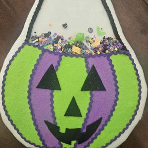 Halloween wreath attachment, jack-o- lantern,  pumpkin wreath attachment, jack-o-lantern with candy,  felt attachment, wreath attachment