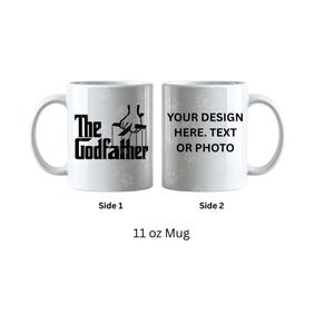 Peut inclure: Mug blanc de 312 g avec le texte "The Godfather" et un graphisme de marionnettiste. L'autre côté indique "YOUR DESIGN HERE. TEXT OR PHOTO."