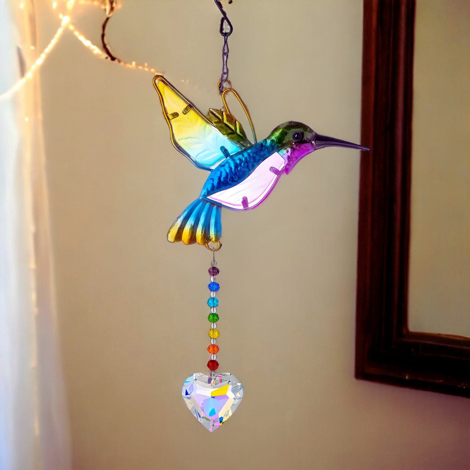 Attrape-soleil élégant en forme de colibri · Creative Fabrica