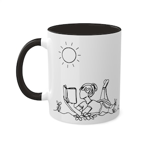 Bookworm's mug
Fun tea cup
Artistic coffee mug
Vibrant mug design
Delightful cup
Cheerful coffee mug
Cute book lover gift