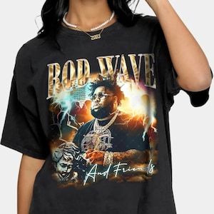 May include: Black t-shirt with a vintage-style graphic of Rod Wave and the text "Rod Wave And Friends".