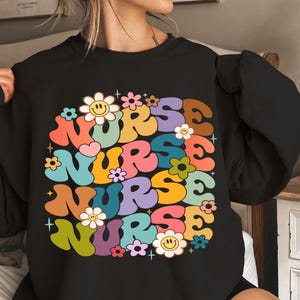 Retro Nurse Crewneck Sweatshirt: Groovy Floral Design