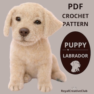 May include: A light tan crochet puppy Labrador, with dark brown eyes and nose, sits on a neutral background. The image includes text that reads "PDF Crochet Pattern" and "Puppy Labrador". A logo for RoyalCreativeClub is also present.