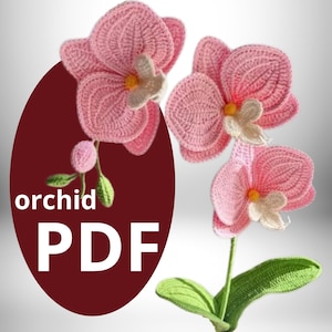 May include: A crochet pattern for a pink orchid flower with green leaves. The pattern is available as a PDF download. The text "orchid PDF" is visible on the image.