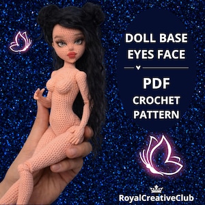 May include: A crocheted doll base with long black hair and a detailed face is held in a hand. The doll is peach-colored and the image includes the text "DOLL BASE EYES FACE PDF CROCHET PATTERN".