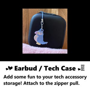 Earbud or technology case charm. Add some fun to your tech accessory storage! Attach to the zipper pull. Embroidered pastel puffin bird penguin.