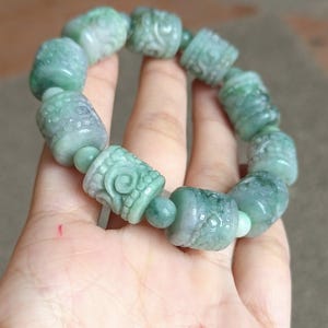 Burmese Jade Bracelet Carved With Vines Green-Gray Cylindrical Shape 13 mm Beads Natural Color