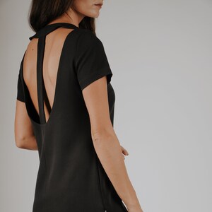 Black mini dress with pockets and open back, Little black dress, KRIKL, Made in Latvia image 1