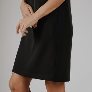 Black mini dress with pockets and open back, Little black dress, KRIKL, Made in Latvia image 9